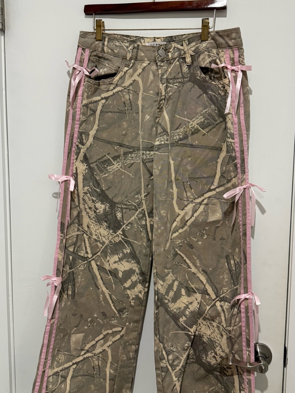 Women’s Camouflage Print Jeans with Pink Ribbon Trim
